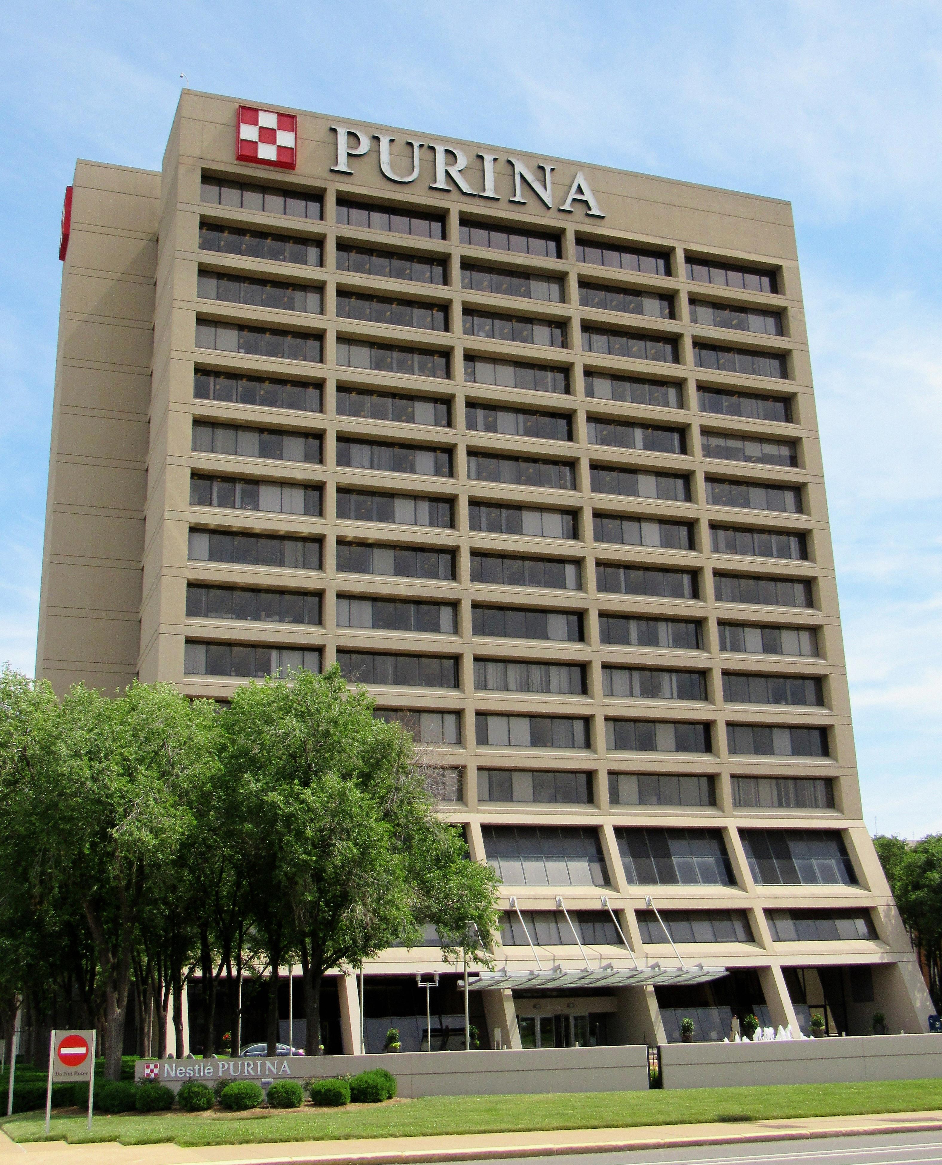 who owns purina